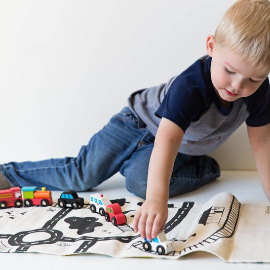 The Toy Overwhelm No One Talks About (And How Montessori Play Changes Everything)